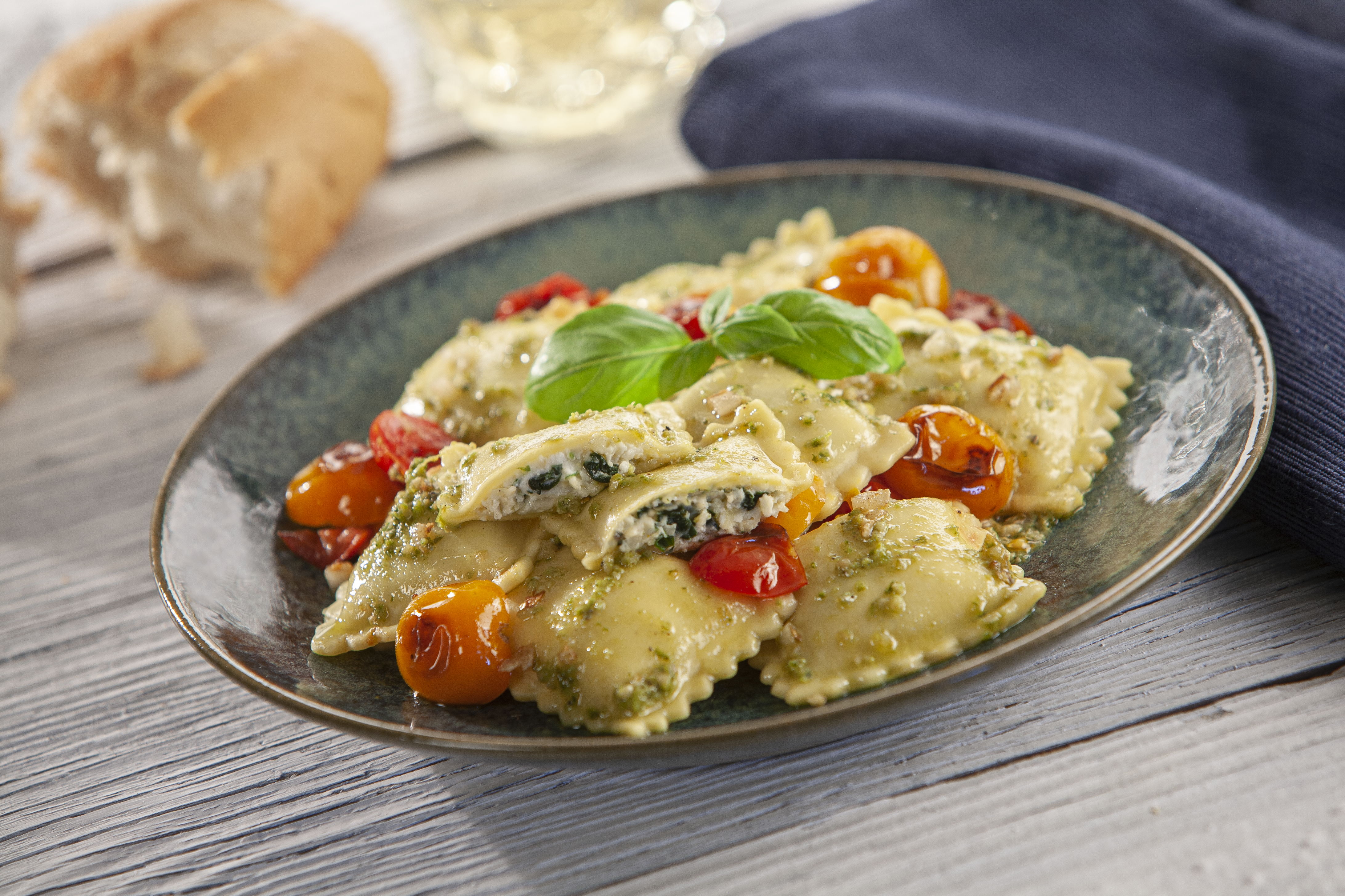 Spinach and Cheese Ravioli with Pesto and Cherry Tomatoes 